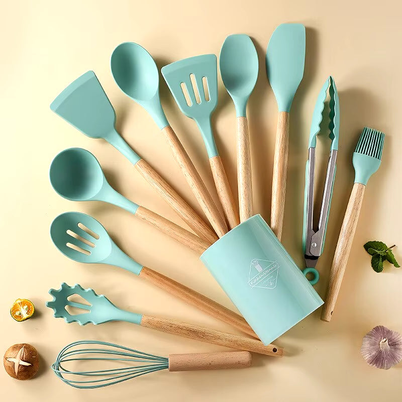 12Pcs/Set Wooden Handle Silicone Kitchen Utensils with Storage Bucket High Temperature Resistant and Non Stick Pot Spatula Spoon.